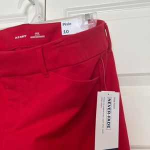 Full length red Old Navy pants.